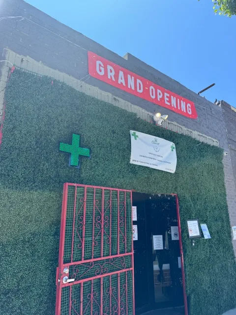 Clovest Retail 2806 storefront with green exterior and red security gate